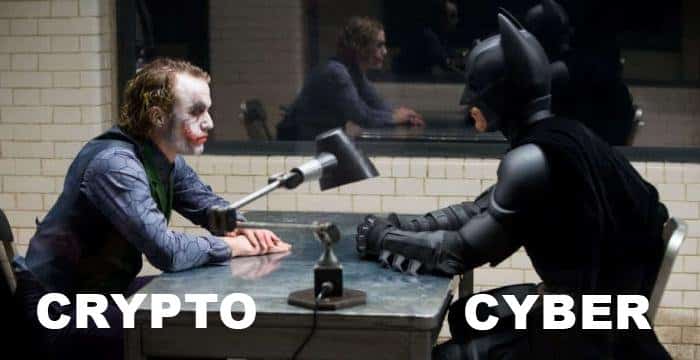 batman and the joker staring at each other, the joker labeled as "Crypto" and batman labeled as "Cyber"